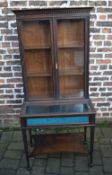 Small early 20th century mahogany display cabinet & case with carved blind fret work & spade feet