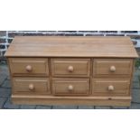 Low level pine chest of drawers