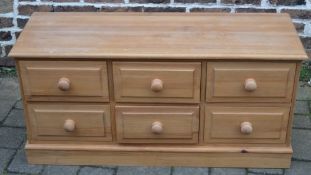 Low level pine chest of drawers