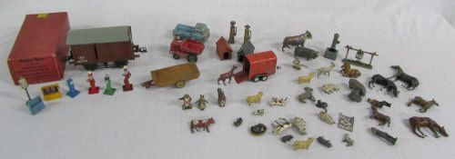 Various Dinky and Britains toys etc inc petrol pumps,