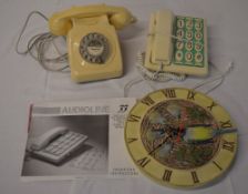 2 retro telephones and a wall clock