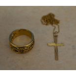 Yellow metal ring and a 9ct gold chain with yellow metal cross