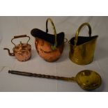 Copper and brass coal buckets,