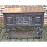 Unusual small late 17th/early 18th century carved oak sideboard with central panelled door & 2