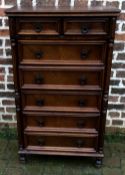 Tall oak chest of drawers