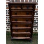 Tall oak chest of drawers