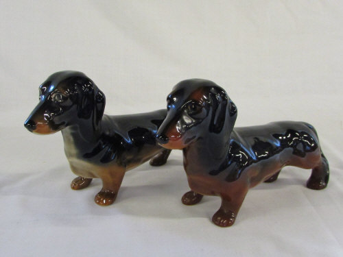 2 Beswick black and brown dachshunds