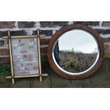 Covenham School 1893 sampler and a round wall mirror