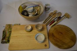 Kitchenalia including a mixing bowl, bread boards, wooden spoons,