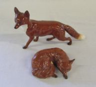 Beswick fox L 23 cm and a Beswick sleeping fox