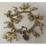 9ct charm bracelet with 9ct animal charms inc elephants, horses & birds 80.