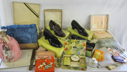 Assorted items inc boxes of vintage shoes, napkins, Yardley, tea cosy,