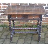 Late 17th/early 18th century oak side table with bobbin turned stretchers & moulded single drawer