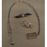 White metal chain with pendant in the form of an abacus,