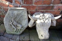 Two concrete plaques of a bulls head & Pegasus