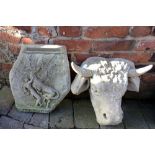 Two concrete plaques of a bulls head & Pegasus