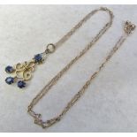 Tested as 9ct gold sapphire pendant and chain total weight 4.
