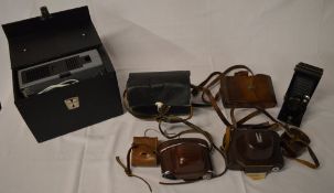 Assorted cameras including Kodak and a slide projector