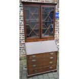 Georgian mahogany bureau with bookcase in the Chippendale style over (back foot requires repairs)