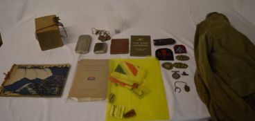 Militaria lot including a British War medal, WW1 dog tags, various patches, military jacket,