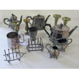 Selection of silver plate and brass inc tea pots and toast racks