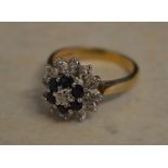 9ct gold diamond and sapphire cluster ring, diamonds approx 0.