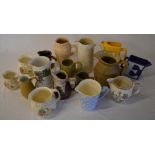 Various ceramic jugs including Worthington and Benson & Hedges advertising jugs