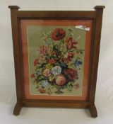 Wooden fire screen with floral tapestry