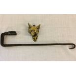 Wrought iron hanging candle holder & a small fox head brass knocker