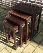 Nest of 4 ebony Oriental tables