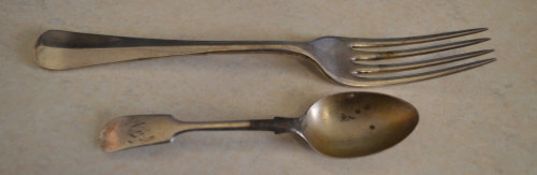 Silver dinner fork and a silver teaspoon, approx weight 3.