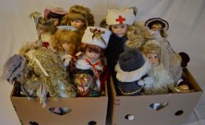 2 boxes of mixed dolls