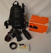 Sony Alpha 300 DSLR camera with carry bag, mono pod, extra lens, charger,