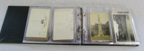 Postcard album containing mainly real photographic and topographical cards inc Lincolnshire