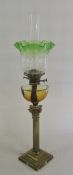 Brass paraffin lamp with green glass shade
