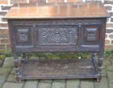 Unusual small late 17th/early 18th century carved oak sideboard with central panelled door & 2