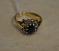 18ct gold sapphire and illusion set diamond ring (with a 9ct gold spacer) approx weight 4.