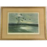 Framed print 'Wigeons beyond the dunes' signed in pencil by the artist Peter Scott.