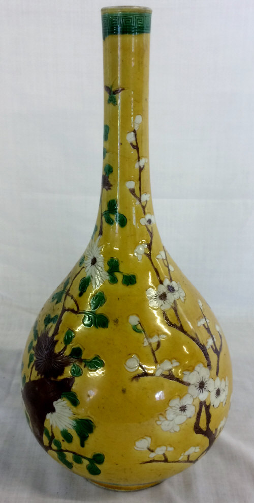 Chinese yellow & green ground bulbous vase with prunus decoration H34cm