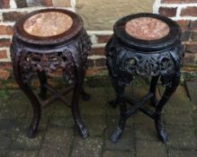 2 carved Oriental wooden plant stands with marble tops