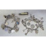 2 silver charm bracelets with silver and white metal charms etc