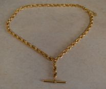 9ct gold chain with a 9ct gold T bar, approx weight 18.