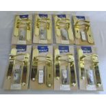 Quantity of brass lever door handles