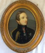 19th century portrait on convex glass of a young officer 34cm by 29cm