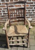 Rush seated spindle back armchair