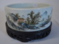 Circular Chinese porcelain hand painted fish bowl with seal mark to base & a wooden stand in