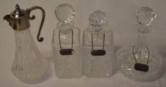 3 glass decanters with silver plated labels and a glass and silver plated water jug