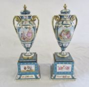 Pair of Sevres style vases with decorated panels H 30 cm