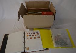 Box of scrapbooks containing stamps,
