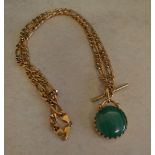 An attractive 9ct gold chain with 9ct gold and semi precious stone fob pendant with unmarked T bar,